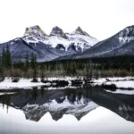 Three Sisters in a perfect reflection - Canmore, AB, Canada - Copyright by MinhTan.net